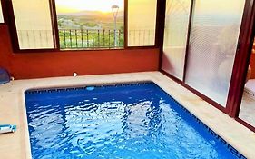 Vivienda de estilo rústico con piscina LA GRANÁ